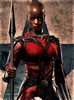 Ayo is a black, queer woman who is a skilled warrior