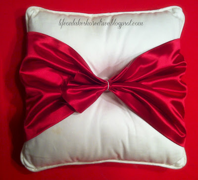 alt="Easy No Sew Pillow with Red Satin Bow tutorial"