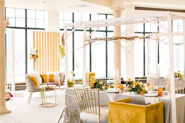 white and yellow reception decor