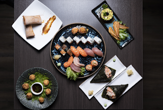 Variedad de platos de Satoru Sushi.