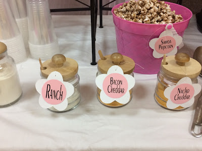 Everyone loves Popcorn, and throwing together a quick popcorn bar is the perfect dessert treat for any occasion. But when the girls are getting together, we need a little bit of fluff and a lot of food.  Check out this quick and easy Popcorn bar using items you probably already own!