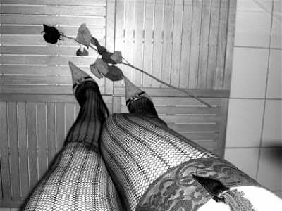 gray heels and fishnet stockings