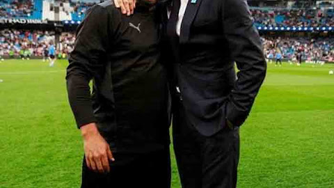 David Beckham with Roberto Carlos