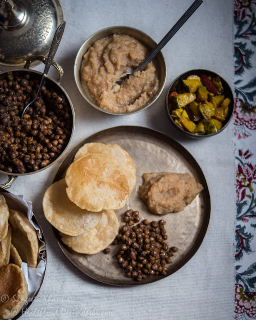 poori chana and halwa meal