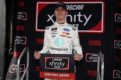 Austin Cindric poses for a photo after winning the pole award  during qualifying for the XFINITY Series Drive for the Cure 200 
