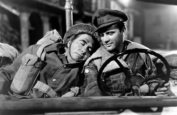 Robert Newton and Richard Burton as British soldiers in a jeep