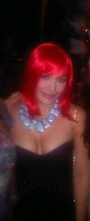 KC Concepcion red wig party