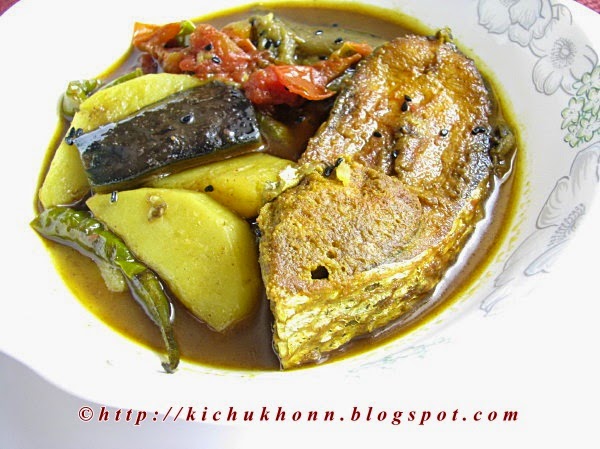 Kalo jeere diye patla ilish jhol