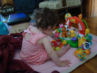 baby with toys photo