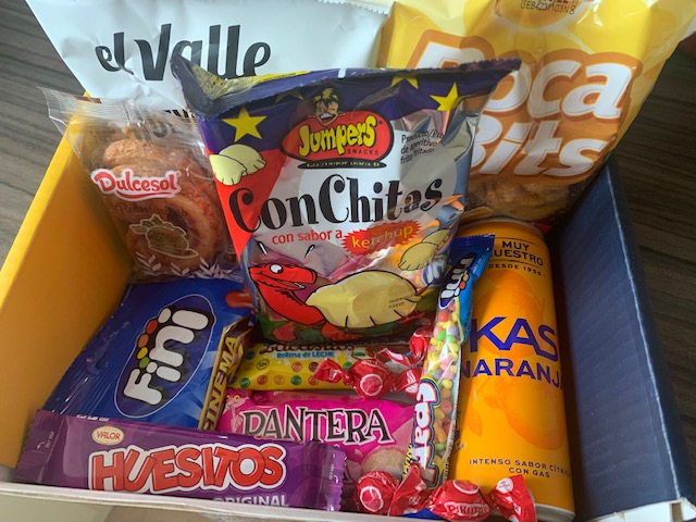 The content of a Spain Snack Surprise box, containing sweet and savoury snacks