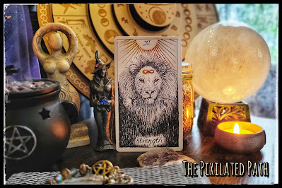 The Strength card from The Wild Unknown Tarot.