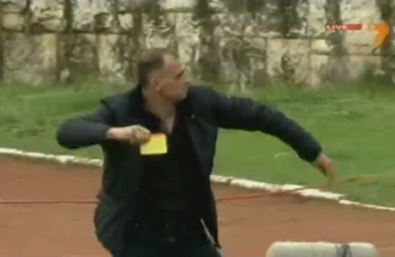 Botev Vratsa coach Antoni Zdravkov throws the cards he stole from the referee