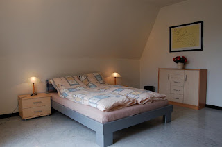 Ferienwohnung Franz Travemünde. Ferienwohnung 1: Schlafzimmer mit Doppelbett.