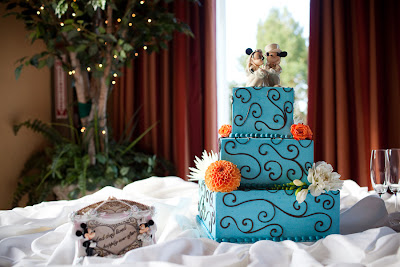 aqua wedding cake with micky mouse and flowers