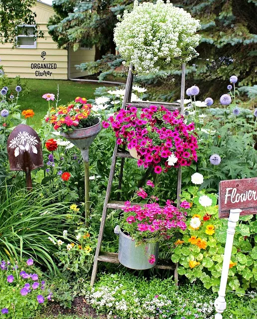 Add A Ladder To Your Flower Garden #junkgarden #gardenjunk #gardenladder #containergarden #rusticgarden