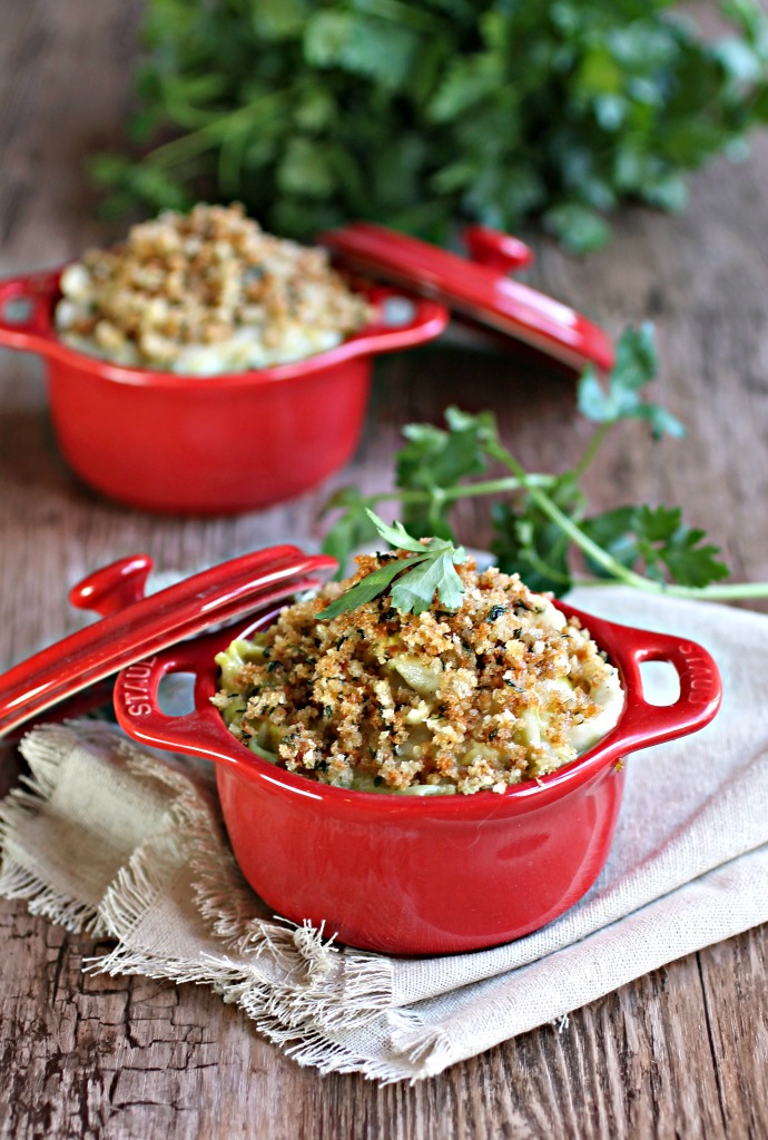 Recipe for a side dish of cabbage simmered in a cheesy sauce with a breadcrumb topping.