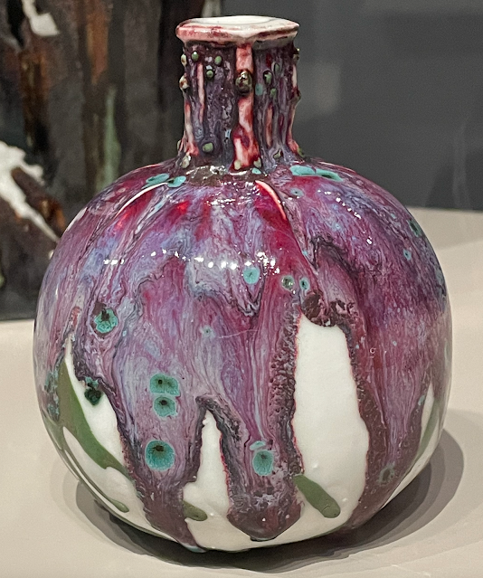 color photo of white porcelain with purple and green glaze, Gourd Vase, made circa 1902 by French potter Taxile Doat, Art Institute of Chicago
