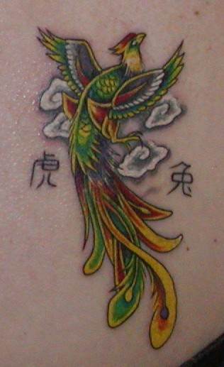feminin tattoo. feminine phoenix tattoos