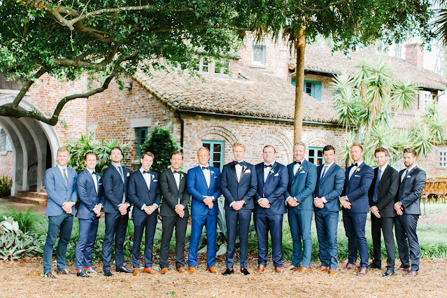 groomsmen in blue tuxedos