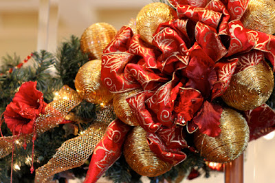 image of gold and red holiday decorations taken by chorale member E. Schneider