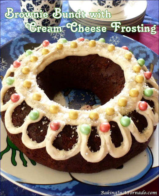 Brownie Bundt with Cream Cheese Frosting | recipe developed by Karen of www.BakingInATornado.com | #recipe #chocolate