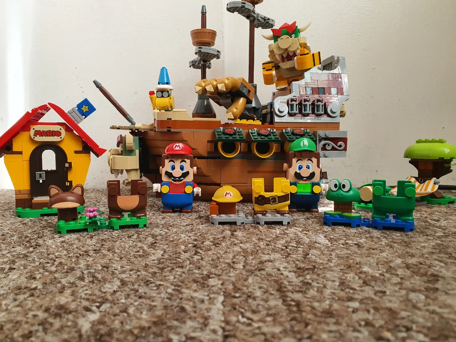 Mario and Luigi figures with Bowsers Airship, Mario's House, and Outfitss