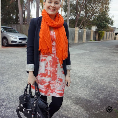 awayfromblue instagram orange dress and scarf with black accessories tights spring work outfit