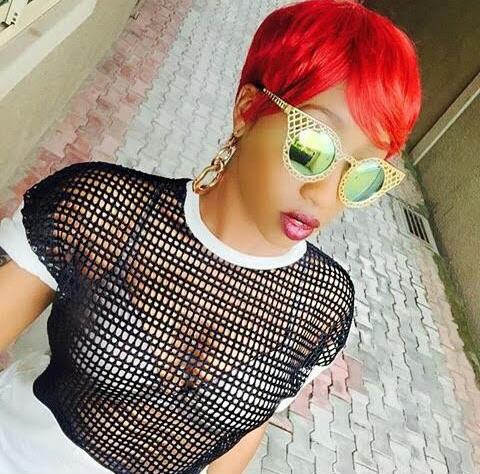 Victoria Kimani stuns in red hair and sexy outfit