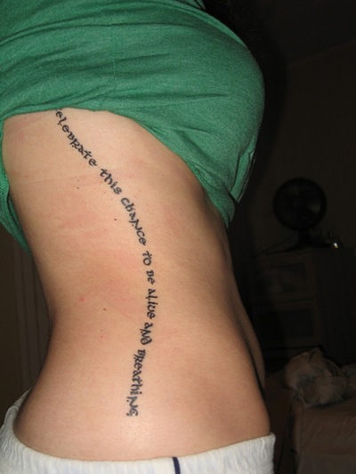 quote tattoos on spine. 2010 tattoo quote ideas. quote