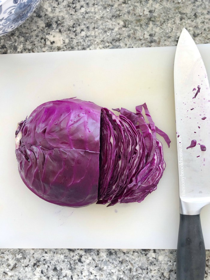 Cutting cabbage into thin slices