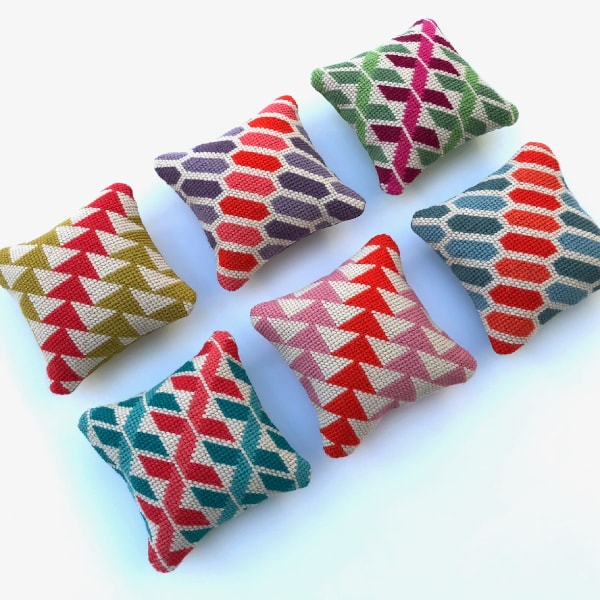 6 mini needlepoint cushions with geometric designs