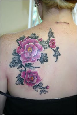 Flower tattoo on sexy girls tattoo