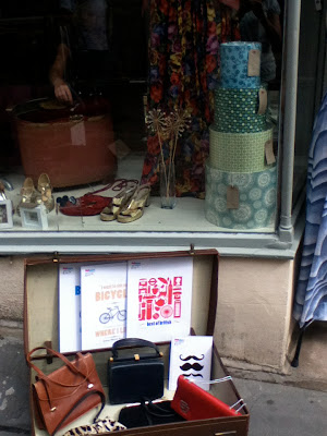 My products in the window of and in front of Poot emporium in Forme