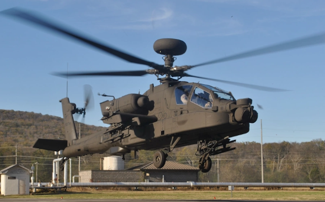 The US Army AH-64E Apache V6.5 Latest Version Attack Helicopter First Flight