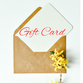 Gift card beside an envelope