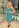 Kate Upton squeezes curves into a turquoise dress at the Michael Kors Event at Fashion Night Out