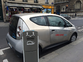 Pic of electric hire car service at roadside in Paris