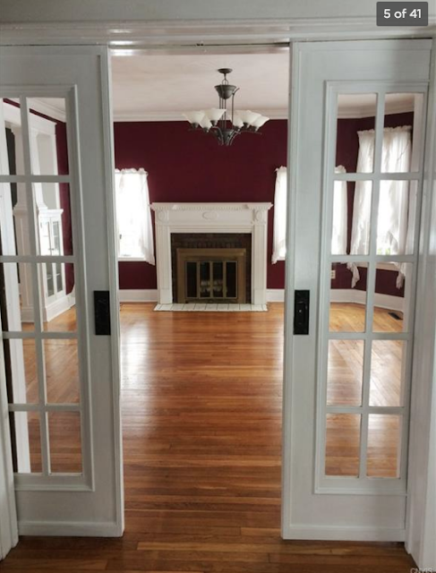 living room view of fireplace through French doors, Aladdin Charleston, 99 Mexico St Camden NY