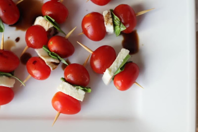 Summer appetizer recipe includes tomatoes and mozzarella cheese. #cookingfromscratch