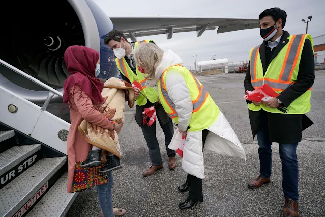 The Arrival of 10,000 Afghan Refugees Marked by Canada