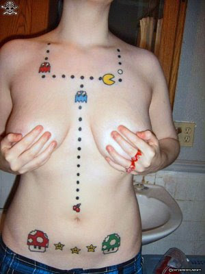 tattoo breast. Pac Man Breasts To see the rest (if your sides can take it without splitting