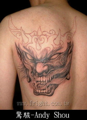 Mr. Evil Tattoo for Free Design Tattooed in the Back