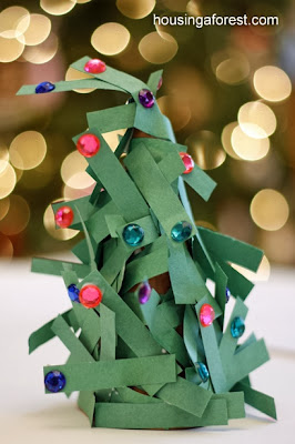 http://www.housingaforest.com/paper-strip-christmas-tree/