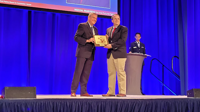 USU's Dr. Thomas Davis received the Military Health System Research Symposium's Distinguished Service Award this week. The award recognizes his contributions to research, focused specifically on the unique medical needs of the warfighter. (Photo credit: Sarah Marshall, USU)