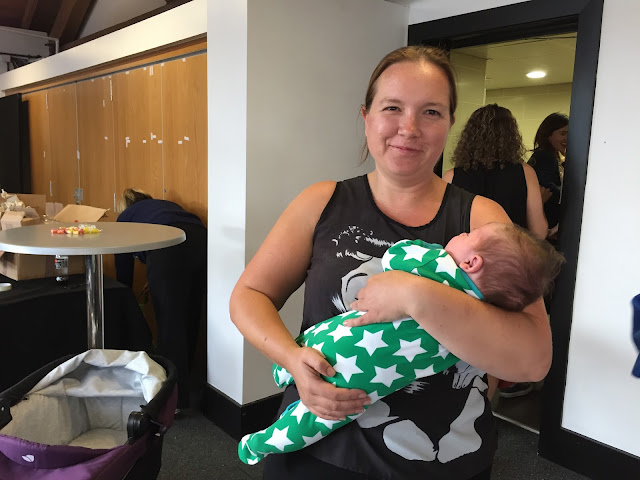 Blog On MSI event organiser cuddling a baby
