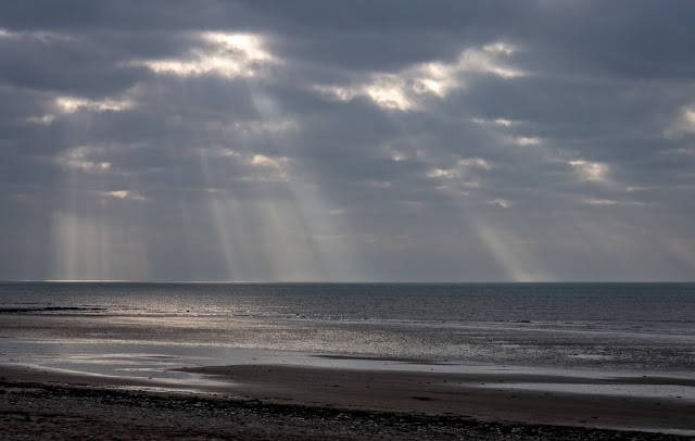 Photo of light rays over the Solway Firth