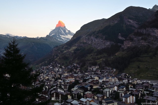 Zermatt and the Matterhorn at dawn. First rays of the morning sun lighting up the tip of the Matterhorn.