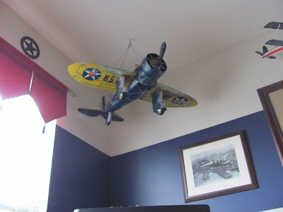  share pictures of my 8 and 4 year olds airplane room for a while now