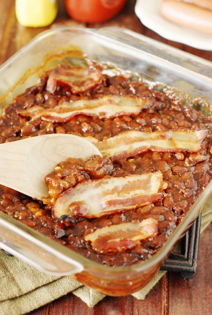 Spicy Baked Beans with Bacon ~ Easily whip up a tasty pan of these semi-homemade baked beans!  They're the perfect cookout side dish.  www.thekitchenismyplayground.com