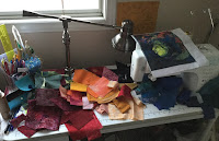 A mess - happy to put away the fabrics to FMQ